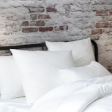 Oreiller en microfibre couleur blanc pour hôtels