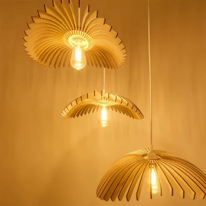 Lámpara colgante triple Cygnes de diseño en madera para hoteles – luz escultural y poética.