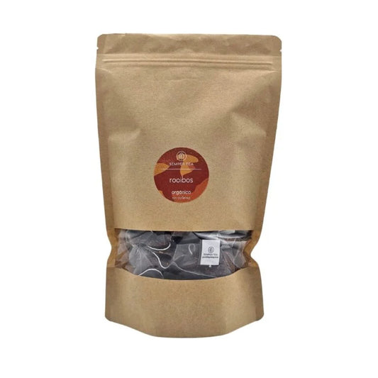 Rooibos en vrac en sachets pyramides dans un sac en papier kraft
